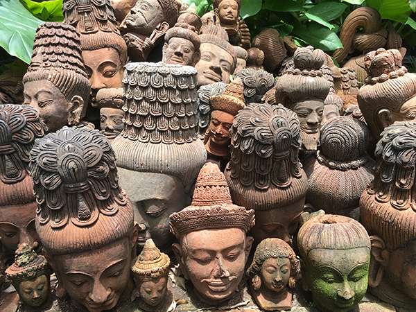 Pile of stone Buddha heads